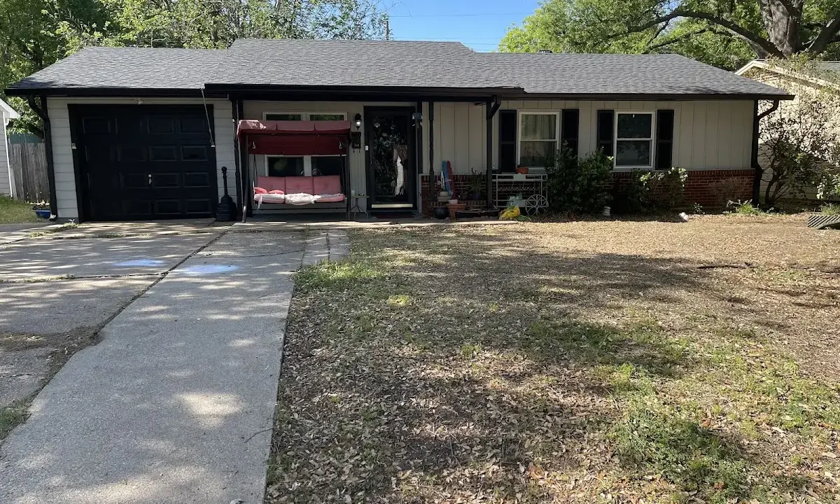 Roof Replacement crew at work on a residential roof in Senatobia